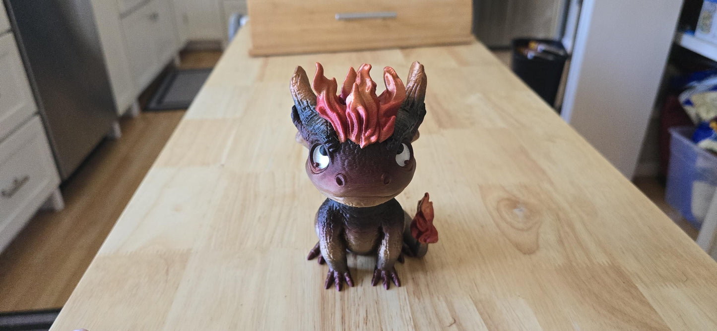 Cute and tiny flame dragon keychain